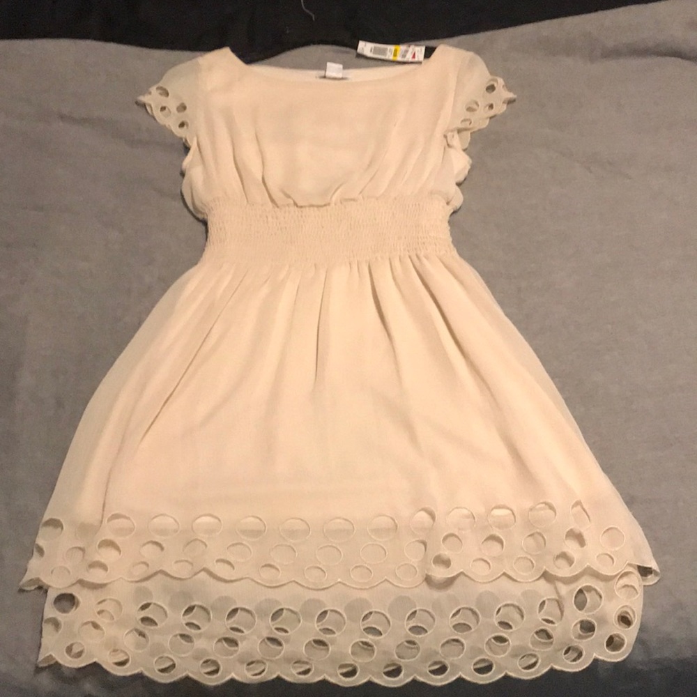 Womens short dress. Tan color.